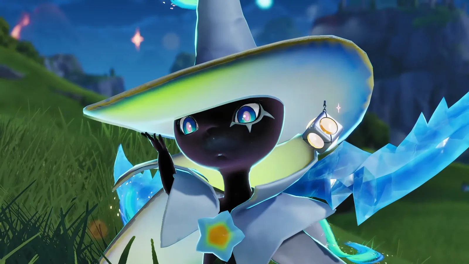 Lex’s Aniimo Stellarys in close-up at night, a black-faced witch with a pale green hat brim, a star brooch and blue crystal blades