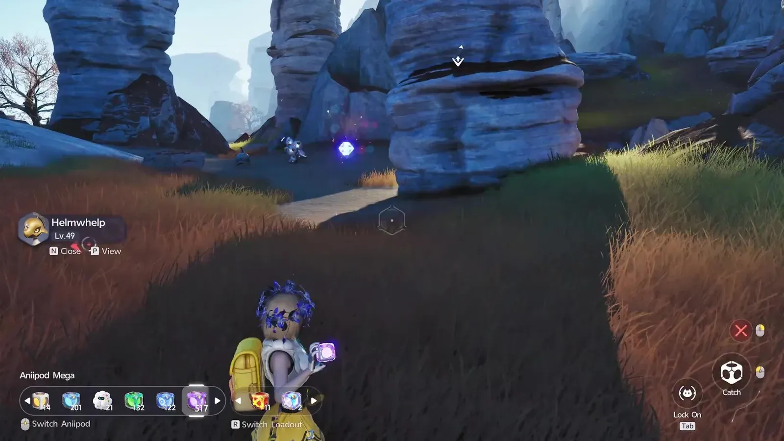 Mountain Form Helmwhelp at Lv.49 in the Aniimo stone pillar forest, its golden head shown in the target panel with the Catch prompt
