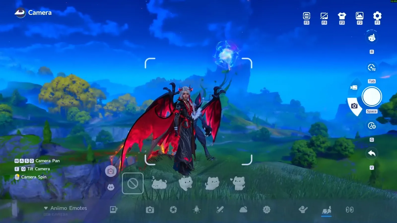 Aniimo Camera mode at dusk on a grassy hill, the Darkborn Phantom outfit with red bat wings and thorn crown posed beside a dark winged Aniimo