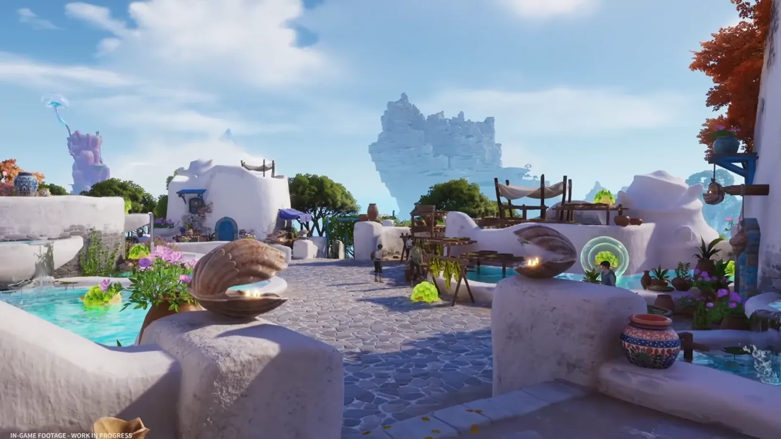 Aniimo Whisperwake Isles village in the Season 1 Part 2 trailer: white round houses, a giant clam shell, blue pools and a sea stack behind