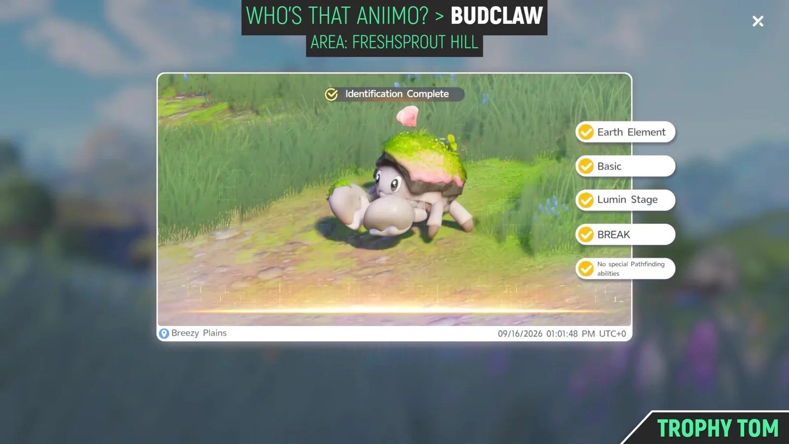 The Aniimo Who’s That Aniimo? identification screen showing Budclaw in the grass with Earth Element, Basic, Lumin Stage, BREAK and No special Pathfinding abilities all ticked