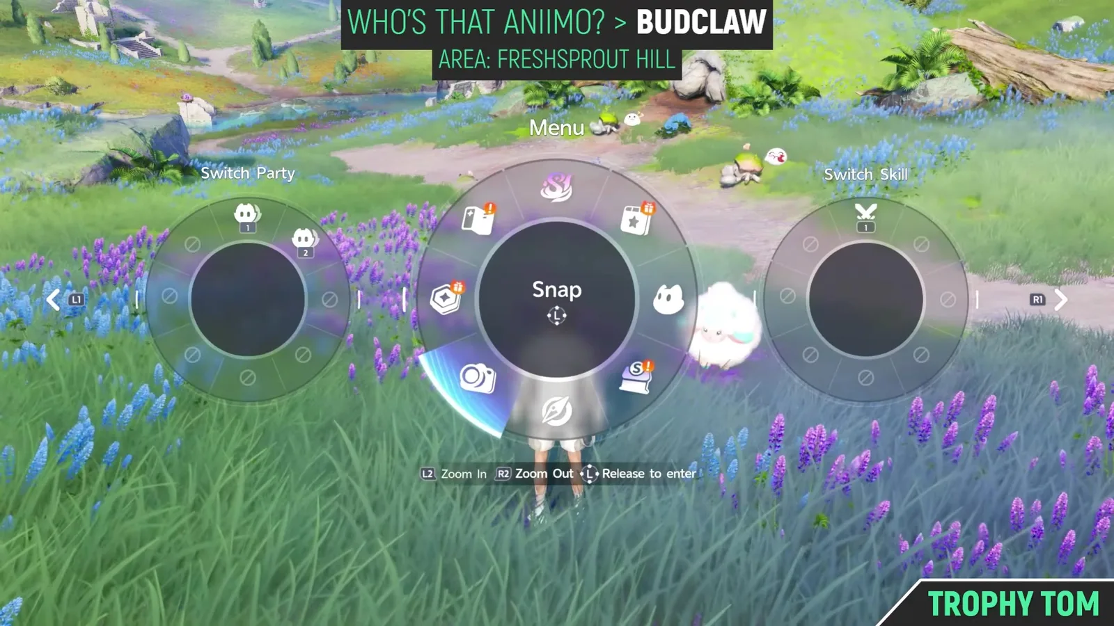 The Aniimo radial menu open in the field with Snap named in the centre and the camera icon highlighted, flanked by Switch Party and Switch Skill rings